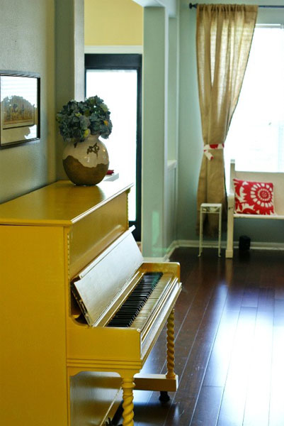 Yellow painted piano