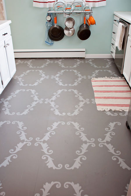 Painted and stencilled plywood floors in kitchen