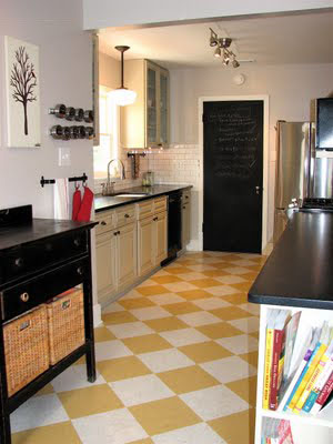 Yellow and white marmoleum floor in kitchen