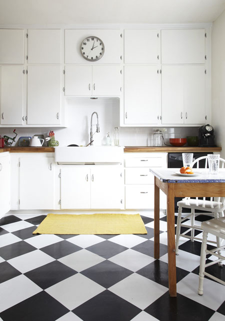 Black and white checkerboard kitchen floor on diagonal