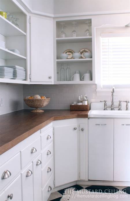 White older kitchen with diy butchers block countertops courtesy of the Mustard Ceiling