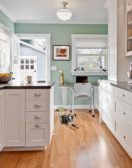 Benjamin Moore Kensington Green kitchen with white cupboards