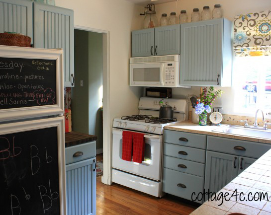Sherwin Williams Rain blue-gray painted kitchen cupboards