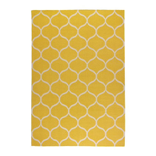 Yellow area rug by Ikea