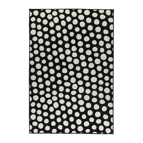 Black and white spotted rug from Ikea