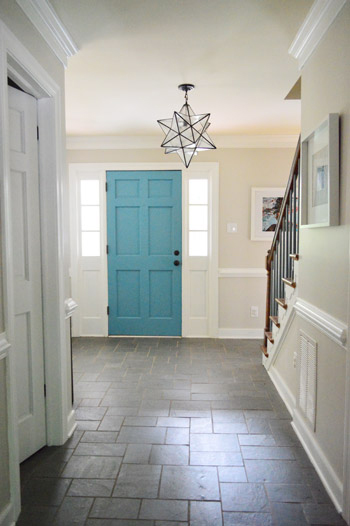Young House Love's amazing teal doorway and star pendant