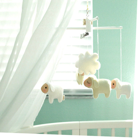 White and beige sheep baby mobile for teal nursery