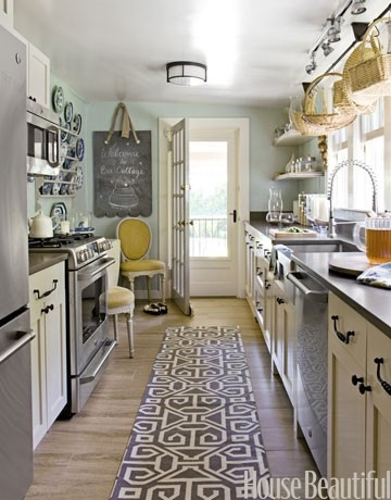 Blue and gold galley kitchen